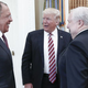 Trump and the Sergeys enjoy a laugh. Photo: Alexander Shcherbak / Getty